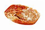 Frozen Chicken Parmesan TV Dinner isolated in white with a clipping path. This mean is still frozen into the shape of the package it came out of. Includes chicken, cheese, spaghetti and sauce.