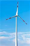 Wind Turbine on blue sky , Alternative energy