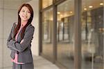 Young attractive business woman with smiling expression.