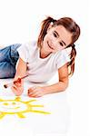 Girl lying on floor and painting a happy sun