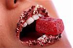 a woman's mouth with candy inside