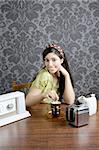 Retro woman drinking coffee on kitchen vintage wallpaper