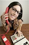 Retro secretary wide angle humor portrait talking telephone woman