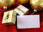 christmas decoration, diamond earrings and gift box  with seasonal greeting card