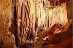 cave stalactites underground cavern magic light in Pyrenees Spain