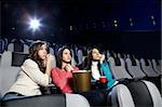 Young girls at viewing of sad cinema