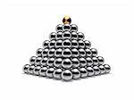 Pyramid of shiny silver balls with gold ball on top