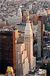 New York City Manhattan aerial skyline panorama view with skyscrapers and office buildings on street.