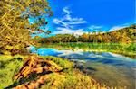 Volcanic lake Telaga Warna at plateau Dieng