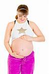 Pregnant female in sportswear holding her belly isolated on white