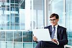 A man in a business suit in the office