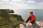 Runner admiring coastal landscape