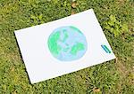 Drawing of globe on lawn