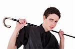 Young confident man holding a cane, isolated on white, studio shot