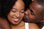 African american man kissing woman