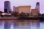 Sunrise in Little Rock, Arkansas. Blurred barque in the foreground.