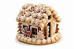 Christmas gingerbread house isolated on white background. Shallow dof