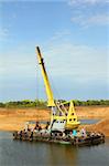 floating excavator - development sandpit with dredge