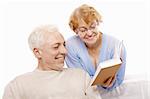 Older persons read the book on a white background
