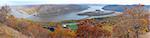 Bear Mountain Autumn panorama aerial view with colorful trees in forest, bridge over Hudson River in New York State.