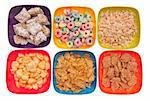Variety of Breakfast Cereal in Vibrant Bowls Isolated on White with a Clipping Path.