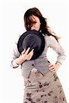 Portrait of a young beautiful brunette posing with hat