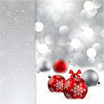 christmas background with red and silver baubles and place for text