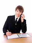 businessman is talking on the phone and sign documents. Isolated at white background