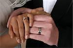 Bride and groom holding hands on their wedding day