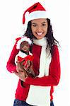 Stock image of woman holding pet Chihuahua, both wearing christmas costume