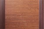 Sample of homogeneous texture of dark wood