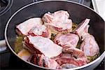 Beef sliced meat cooking in frying pan