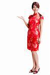 Asian Chinese woman in Traditional Chinese Cheongsam gesturing