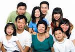 Asian family portrait on white background, 3 generations.