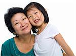 Asian grandmother and grandchild on white background