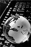 globe and keyboard showing global communication or internet concept