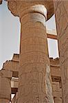 Columns with hieroglyphic carvings at Karnak temple in Luxor