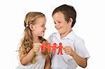 Happy kids holding paper people - united family concept, isolated