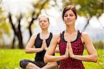 Meditation in the a park on a warm summer day