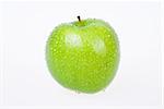 Green apple over white background - isolated