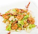 Salad with shrimps and vegetable closeup
