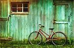 Digital Painting of old bicycle  against grungy barn