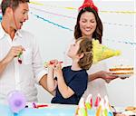 Happy family celebrating little boy's  birthday at home