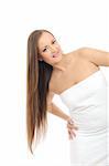 Beautiful spa woman with long healthy hair in white bath towel. isolated on white background