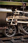 piston and wheel detail of an old steam locomotive