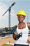 A Female Construction Worker on a job site.