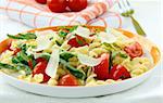 pasta salad with tomatoes and arugula in the Italian style