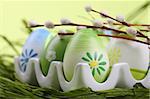 Colorful Easter eggs in an egg holder. Shallow dof