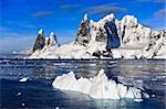 Beautiful snow-capped mountains against the blue sky in Antarctica