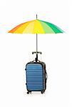 Travelling concept with case and umbrella on the white